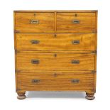 A campaign camphor wood chest of drawers, 19th century, brass bound, two short over three long