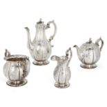 A matched Victorian silver four piece tea service, the tea pot, milk jug and sugar London, 1843,