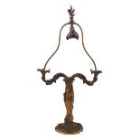 A French gilt-bronze twin branch table lamp, by Eugene LeliÃ¨vre, c.1900, of Louis XV style, the