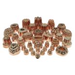 A collection of thirty-eight copper jelly moulds, 19th century, mostly English, with various