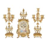 A French ormolu and porcelain mounted clock garniture, late 19th century, the central clock with