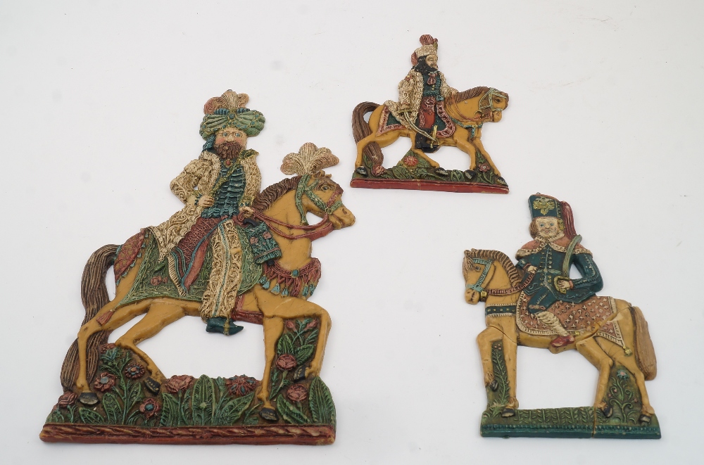 Three Austro-Hungarian polychrome wax relief figures on horseback, late 19th century, depicting