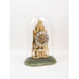 A brass skeleton clock, by Elliott of London, late 20th century, the brass case of architectural