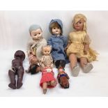 A mixed lot of vintage composition and plastic dolls, together with a hard plastic doll, dressed