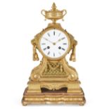 A French gilt-bronze mantle clock, 19th century, the ormolu case surmounted by a twin handled urn,