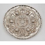 A Portuguese repousse dish, 833 standard, Lisbon, 1887-1937, decorated with a central armorial crest