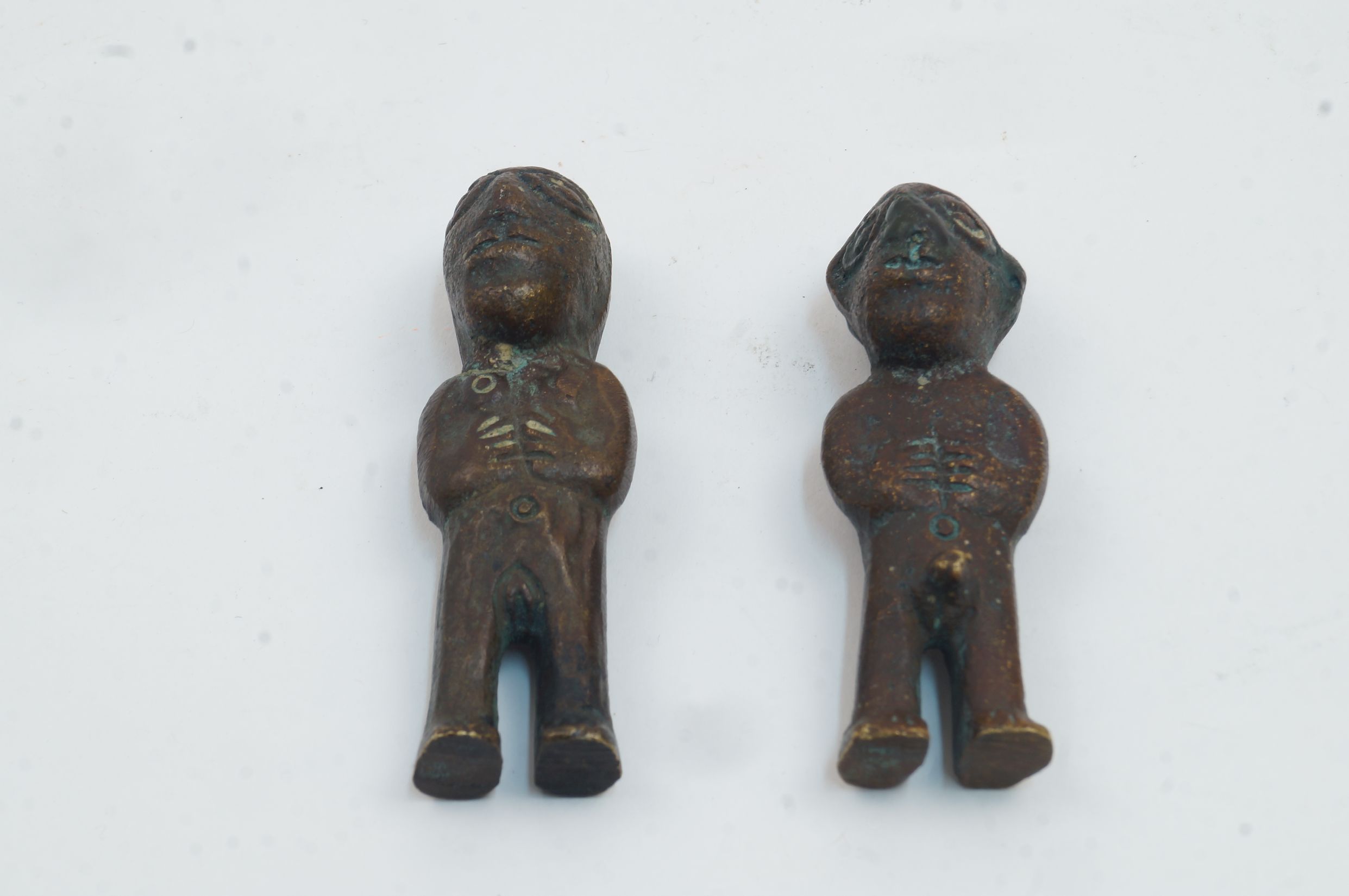 A group of three West African stylised cast brass figures, 20th century, to include: a seated figure - Image 2 of 2