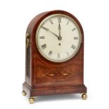 A George III mahogany and line inlaid fusee bracket clock, early 19th century, the arched mahogany