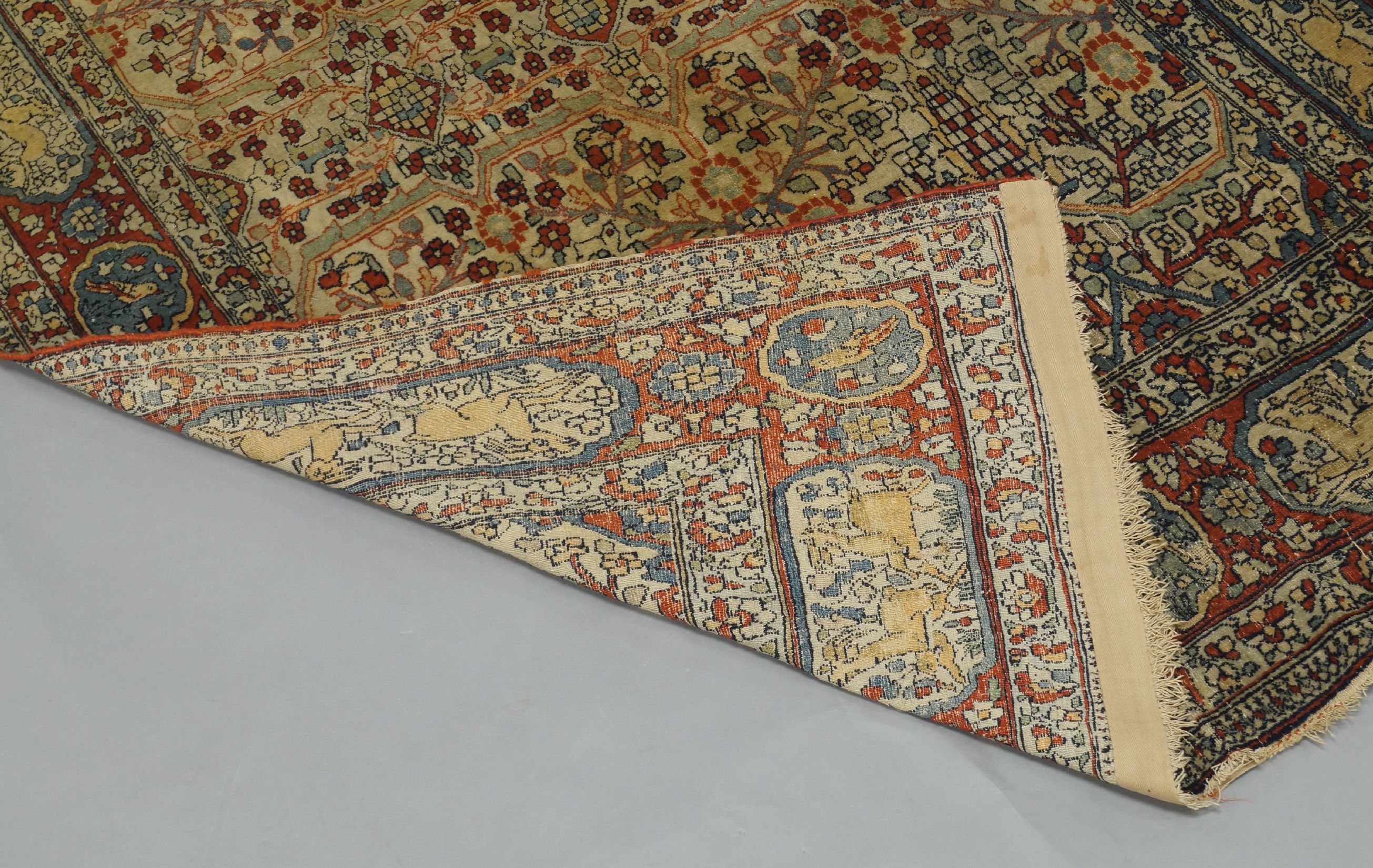 A Persian Isfahan rug, 20th century, the main field with floral registers, on ivory ground, within - Image 3 of 3