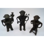 A group of three West African stylised cast brass figures, 20th century, to include: a seated figure