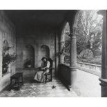 British School, late 19th/early 20th century- A young woman reading in the loggia at Cranborne