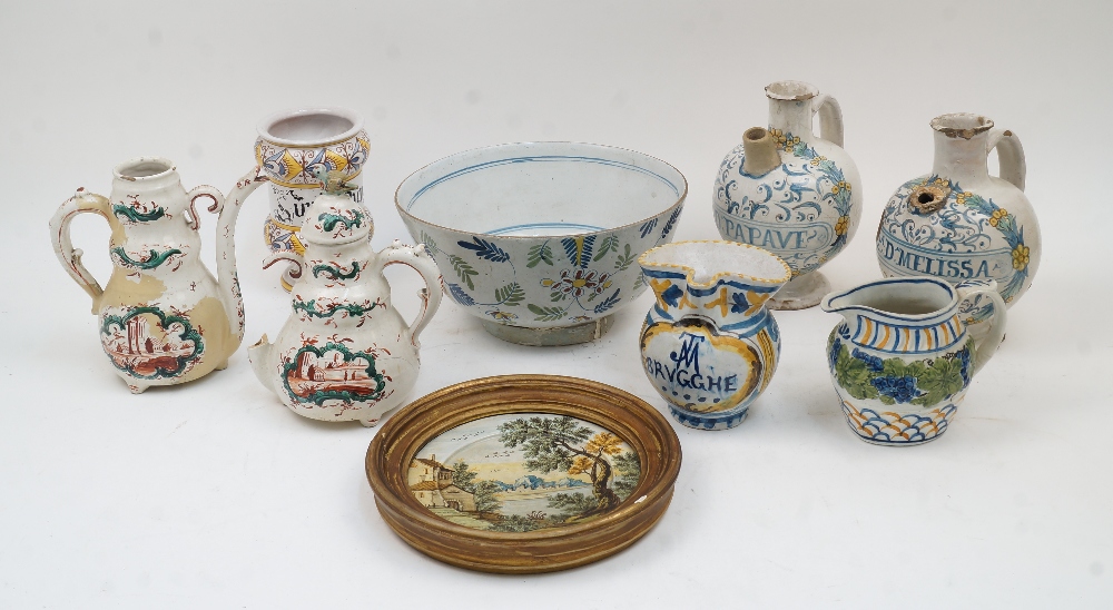 A group of Continental ceramics, to include: two Italian maiolica bulbous syrup jars, possibly