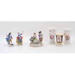 A Vienna porcelain figure group of a piper with a girl and goat by his side, 19th century, blue