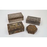 Four Persian Khatam boxes, to include: one with white metal panels with scrolling foliate decoration