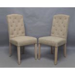 A set of six modern dining chairs by Neptune, with button back upholstery, raised on limed oak