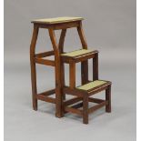 An early 20th century mahogany metamorphic stool/steps, 71cm high, 35cm wide, 29cm deepAn early 20th