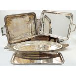 Four silver plated trays and a silver plated fish platter, designed with head and tail as twin