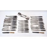 A set of 18th century knives with silver mounted wooden handles, comprising 21 table knives and 10