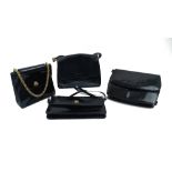 A group of four black handbags, to include a Rayne leather and leather effect handbag with