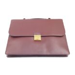 A Must de Cartier leather briefcase, with gilt metal clasp, with dust bag, 30.5cm high, 40.5cm