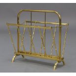 A French brass folding magazine rack, circa 1960, with folding sides on curved supports, 43cm