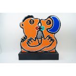 Moustache Bleue, French b.1952- The Orange Couple; acrylic on wood and epoxy resin sculpture, signed