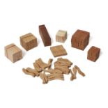 Brian Willsher, British 1930-2010 - A Group of 7 Puzzles; oak, teak and beach, H7.5 x W7 x D7 cm