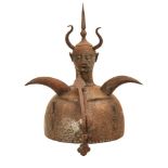 A Qajar steel Khula khud helmet with double demon head, Persia, 19th century, 37cm. high Provenance: