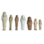 Six Egyptian glazed faience shabtis Third Intermediate-Late Period, 1070-332 B.C. Each of typical