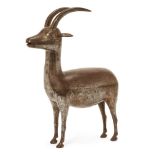 A Qajar gold and silver-damascened steel Ibex, Persia, 19th century, standing upright and facing