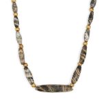 A Roman banded glass beaded necklace Circa 1st-4th Century A.D. Composed of barrel-shaped beads