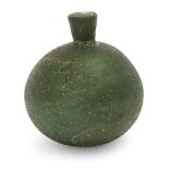 A green glass flask, Persia, 9th century, of spherical form, 11cm. high Large chip to rim and neck