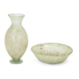 Two ancient glass vessels, Roman – Islamic Periods, A Roman pale blue-green glass ovoid bottle