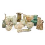 A group of Roman and later glass vessels 1st Century A.D. and Later, including a bottle with