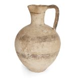 A Cypriot Iron Age Bichrome Ware amphora with pinched-in lip, the body decorated with two groups
