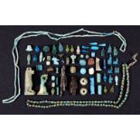 A miscellaneous group of Egyptian faience amulets, pendants and beads, New Kingdom – Late Period,