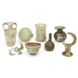 A collection of Roman glass vessels Circa 1st-4th Century A.D., including a small Roman bowl with