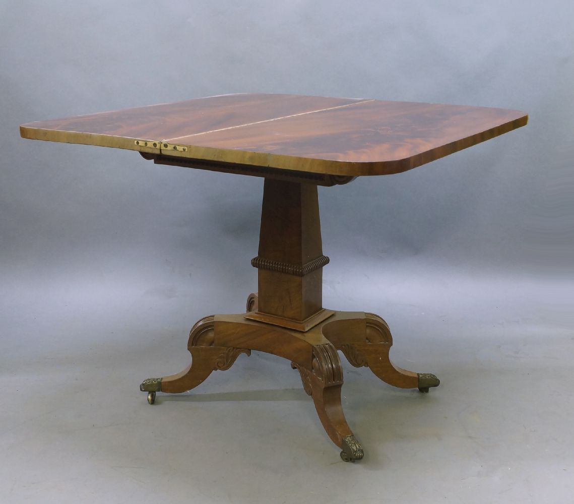 A Regency mahogany fold over tea table, the rectangular top with rounded edges, above trapezium - Image 2 of 3