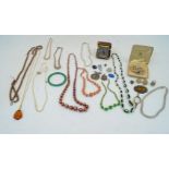 A collection of costume jewellery, to include cultured and faux pearl necklaces, agate brooch,