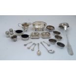 A collection of silver and white metal items, including: a Continental fiddle pattern silver