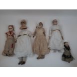 Five wax over composition/composition dolls in need of restoration, four having all original clothes
