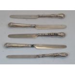 A group of silver knives with filled silver handles, comprising: five William IV knives,