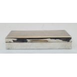 A George VI silver cigarette box, London, 1943, S J Rose & Son, of rectangular form with engine