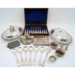 A small quantity of silver plate, including: an oak cased set of six mother of pearl handled fruit