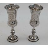 A pair of silver Kiddush wine cups, London, 1920, J Zeving (or Joseph Zweig), of baluster form on