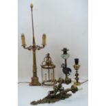 A French gilt-bronze twin-light candelabrum, late 19th century, converted to electricity, with tri-