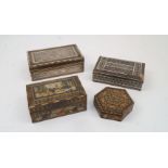 Four Persian Khatam boxes, to include: one with white metal panels with scrolling foliate decoration