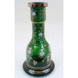 A Bohemian green glass bottle vase, 19th century, the thickly blown rim with gilt highlights, the