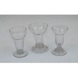 Three various jelly glasses, mid 18th century, two with ribbed bodies, on spreading feet, 10.3cm