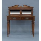 A Regency style mahogany side table, early 20th century, the mirrored back superstructure with